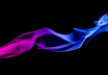 Fototapeta premium Colored smoke on black background