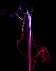 Colored smoke on black background
