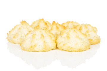 Lot of whole homemade golden coconut biscuit isolated on white background