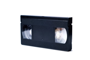 Obraz premium Retro videotape on white background, close-up isolate.