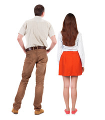 Back view of couple. beautiful friendly girl and guy together.