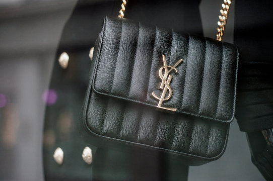 Mulhouse - France - 1 December 2019 - Closeup of Black leather handbag by Yves Saint Laurent in a luxury fashion Store showroom