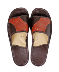 Domestic leather slippers, home shoes. Isolated on white.