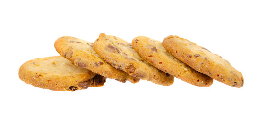 Round cookie with chocolate drops. Isolated on white.