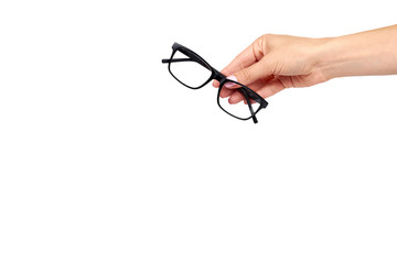 Hand with black eyeglasses, eye optic correction tool.