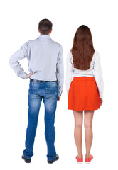 Back view of couple. beautiful friendly girl and guy together.