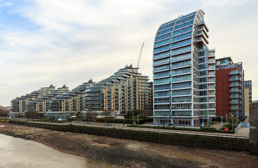 Battersea is a district of south west London, England, within London Borough of Wandsworth. It is located on the south bank of the River Thames, south west of Charing Cross. Battersea Reach Resident.