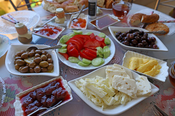 Morning Breakfast with Cheese, Olives, Tomatoes, Jam, Honey and Butte