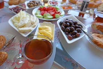 Morning Breakfast with Cheese, Olives, Tomatoes, Jam, Honey and Butte