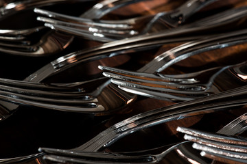 Set of forks on buffet table