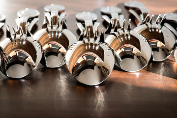 Spoons and forks on breakfast buffet table in the hotel