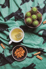herbal tea with almonds, relax and healthy lifestyle
