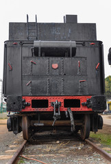 Fototapeta premium Railroad history: old steam locomotive in Alcazar de San Juan, Ciudad Real, Spain.