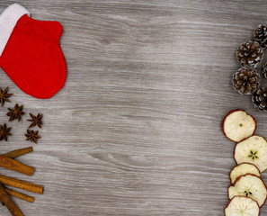 Glove and christmas decoration on a wooden table