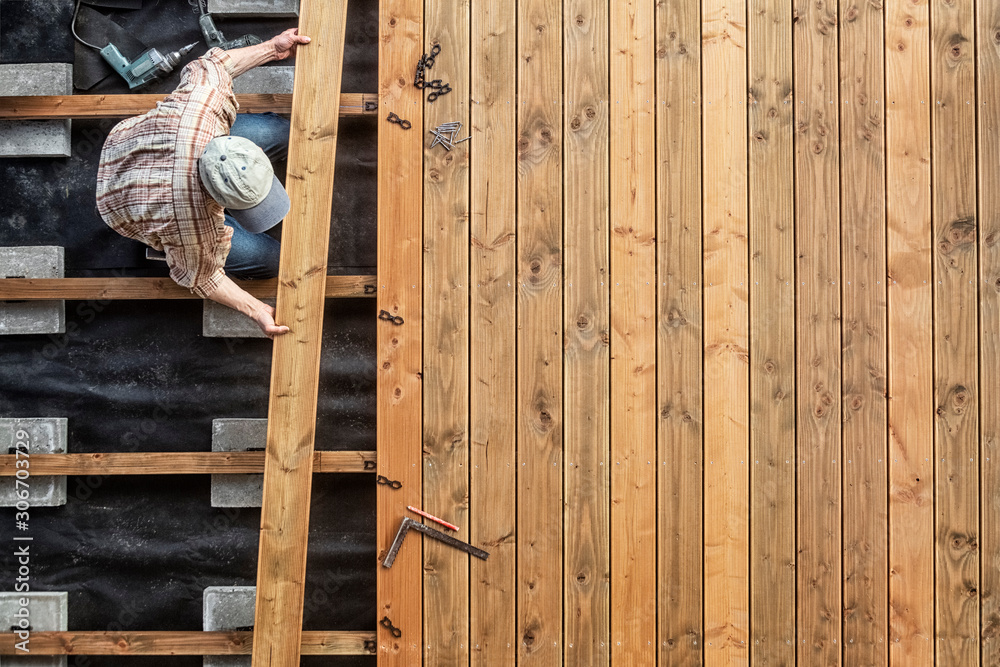 Wall mural constructing a wooden flooring of a terrace, douglas fir