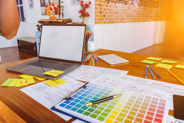 Soft Focus,A team of UI / UX web designers are working together to develop a mobile responsive...
