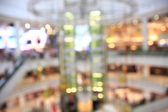Abstract blur shopping mall in deparment store for background,blur background image of department store.