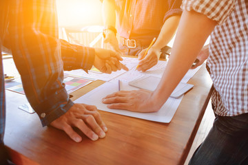 Soft Focus,A team of UI / UX web designers are working together to develop a mobile responsive...