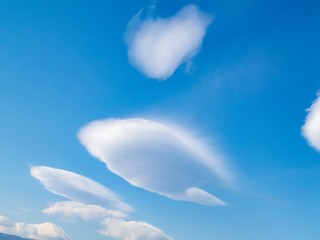 blue sky with clouds and sun