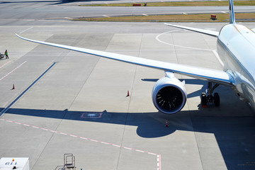Airplane getting ready at terminal