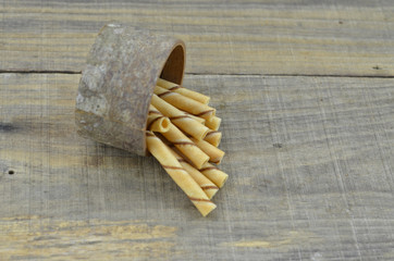 Delicious vanillia wafer roll stick on wooden background