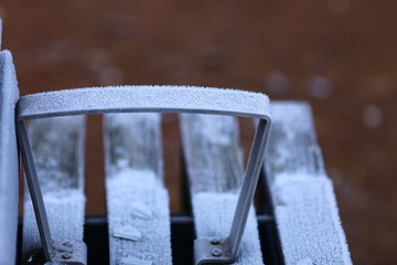 Frosty cold winter bench outside