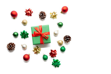 Isolated Christmas composition with gift and ornaments