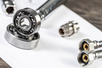Obraz premium Plumbing pipeline and ball bearings