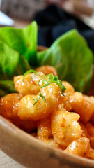 closeup on a dynamite shrimps fresh dish served in a fancy decoration