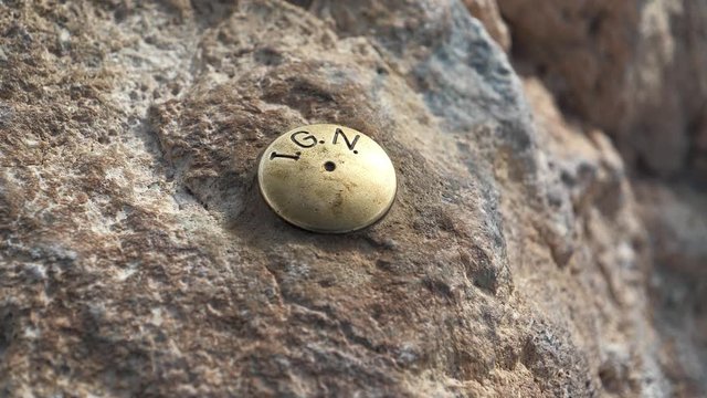 Metal mark on the peak of Volcano Teide, Tenerife island, Canary islands, Spain