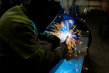 welder work, welding sparks, workshop production