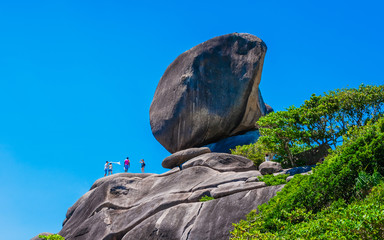 Adventure nature scenic landscape Similan islands with travelers on rock hill, Famous landmark...