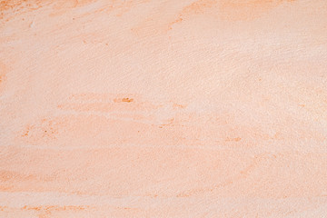 Surface of the wood is light brown background close-up.