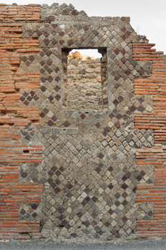Opus reticulatum brickwork in an opus mixtum wall of Pompeii (Pompei)
