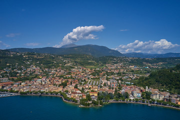 Fototapeta na wymiar Panoramic view of the resort town of Garda the north of Italy. Aerial photography. Rocca Del Garda.