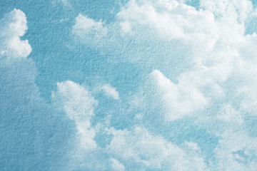 Double exposure of cloud and sky of paper texture for background Abstract,postcard nature art pastel style,soft and blur focus. © Chunnapa