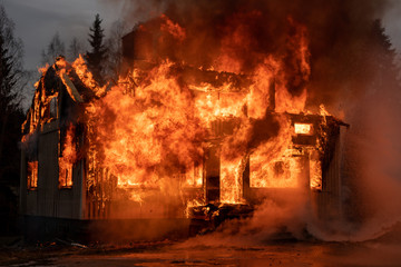 Fototapeta na wymiar Burning house