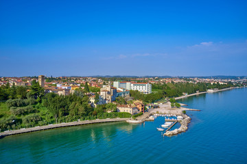 Aerial photography with drone. Beautiful view of the city of Rivoltella del Garda, Italy.