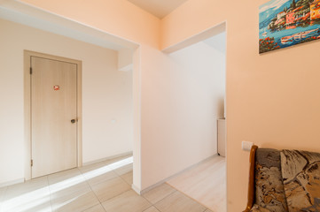 Russia, Moscow- July 25, 2019: interior room apartment. standard repair decoration in hostel. room doors, repair corridor