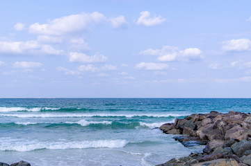 Sea. The waves. The stones. The clouds. Coast.