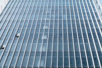 underside panoramic and perspective view to steel blue glass high rise building skyscrapers, business concept of successful industrial architecture