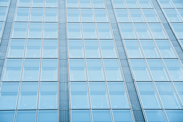 underside panoramic and perspective view to steel blue glass high rise building skyscrapers, business concept of successful industrial architecture