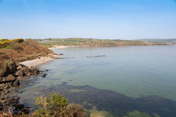 Fototapeta na wymiar Clear sea at Ligwy beach in Anglesey, North Wales UK