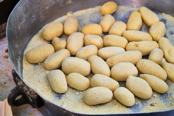 Arrubiolus, sardinian sweet or salad finger food, made by fried seada cheese