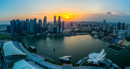 Fototapeta na wymiar Singapore financial district skyline in beautiful sunset, Singapore city