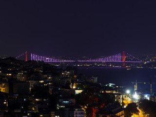 Fototapeta na wymiar View of the Bosphorus Bridge by night. In Istanbul, Turkey