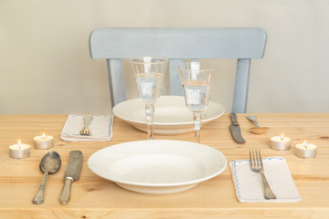 Fototapeta na wymiar Scandinavian style table setting with neutral and natural colors.
