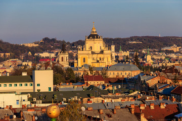 Fototapeta na wymiar Aerial view of St. George's Cathedral and old town of Lviv in Ukraine. Lvov cityscape. View from bell tower of Church of Sts. Olha and Elizabeth