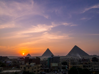 View of the Pyramids of Giza at sunset. In Cairo, Egypt