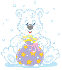 Fototapeta premium Joyful and friendly smiling little polar white bear and a beautiful bag with holiday gifts, vector cartoon illustration